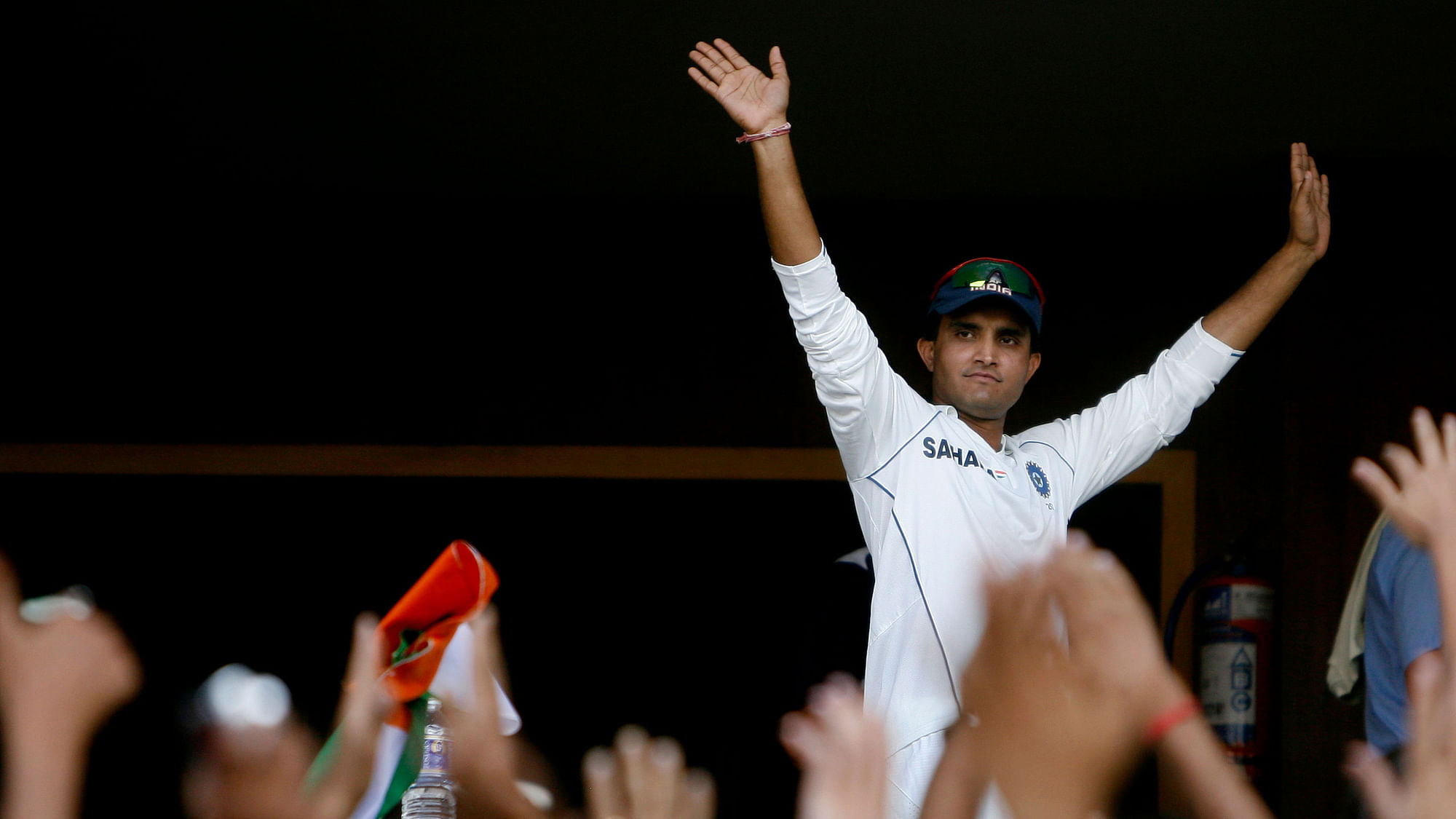 India’s Sourav Ganguly greets fans from a pavilion after winning the four Test cricket match series against Australia by 2-0 in Nagpur on 10 November, 2008.&nbsp;