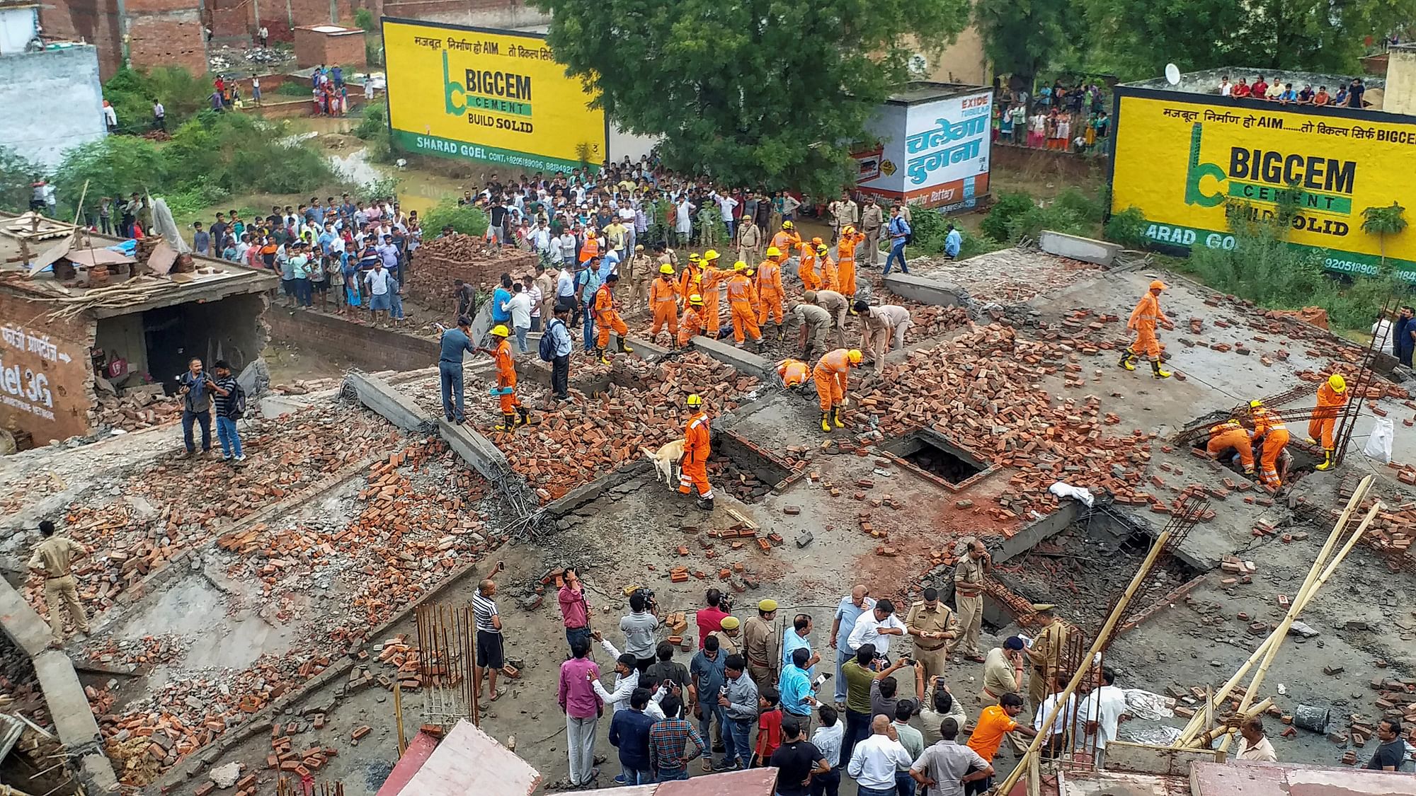 Rescue works underway after an under-construction building collapsed at Masuri, in Ghaziabad