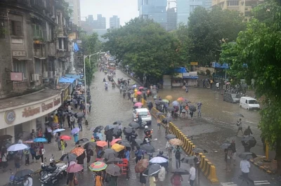 Mumbai: A view of the water-logged Hindmata road as heavy rains continue to batter Mumbai, on July 10, 2018. (Photo: IANS)