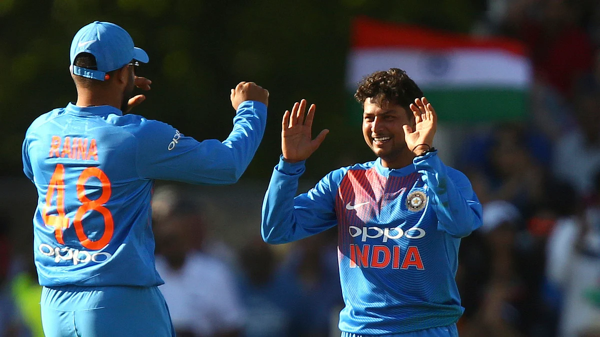 India’s Kuldeep Yadav, left, celebrates with India’s Suresh Raina after taking the wicket of England’s Jonny Bairstow during the Twenty20 cricket match between England and India at Old Trafford cricket ground in Manchester, England, Tuesday, July 3, 2018. 