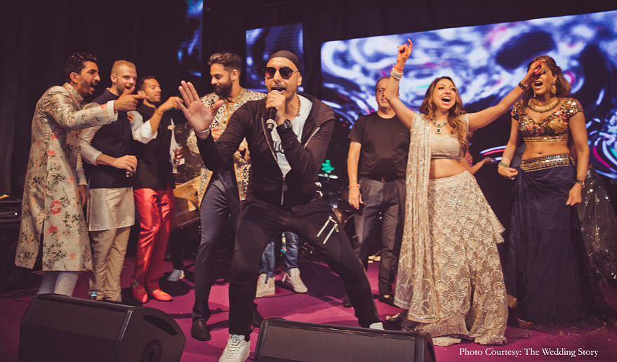 Sukhbir Singh sang for the <i>sangeet</i> and got all the guests on the dance floor.&nbsp;