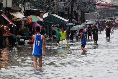 Filipinos grapple as heavy rains lash country