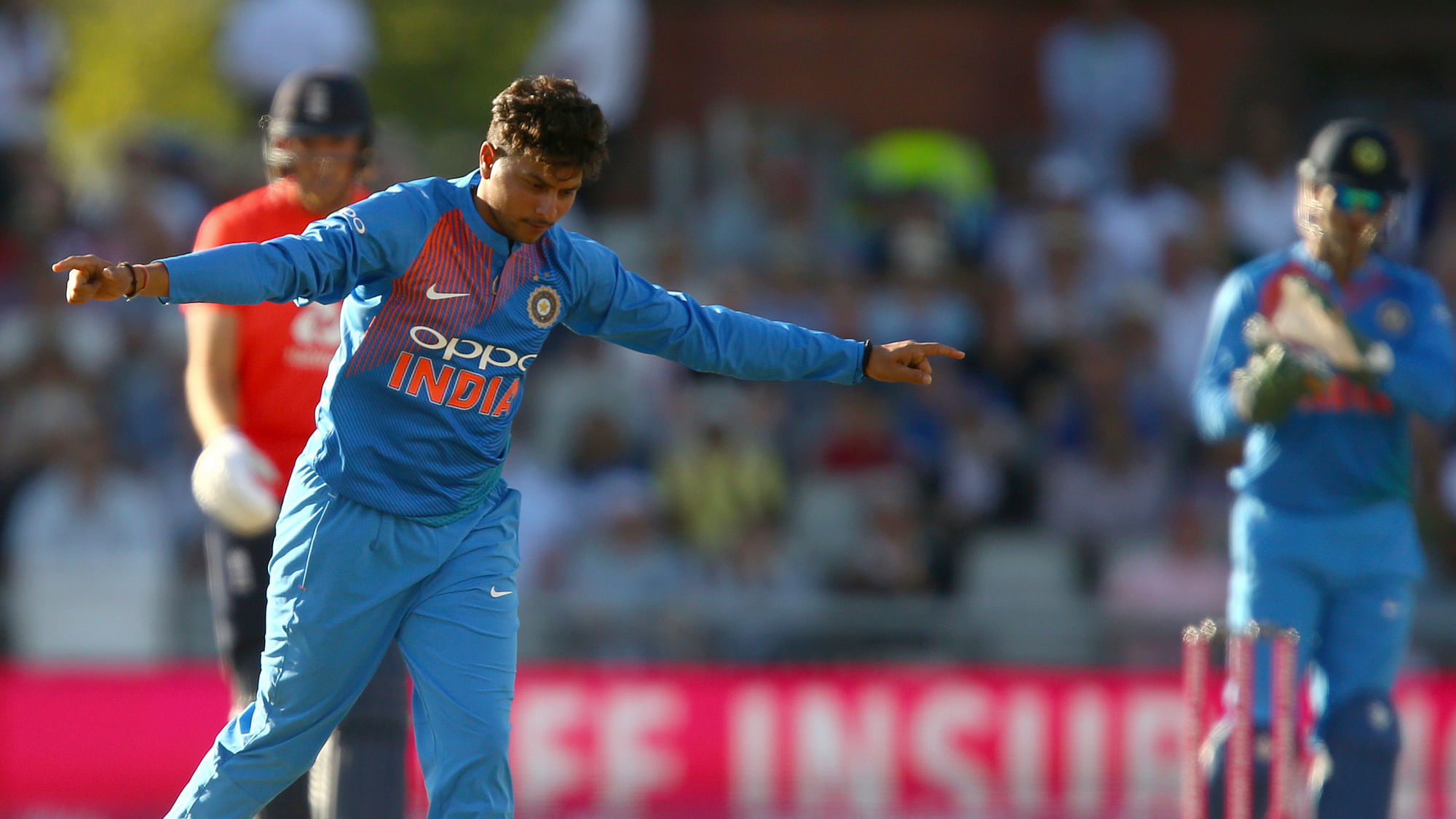 Kuldeep Yadav celebrates taking a fifer against England in the first T20 at Old Trafford.
