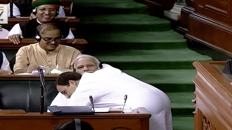 Rahul Gandhi gives PM Narendra Modi a hug after his speech in Lok Sabha ahead of the no-confidence motion.