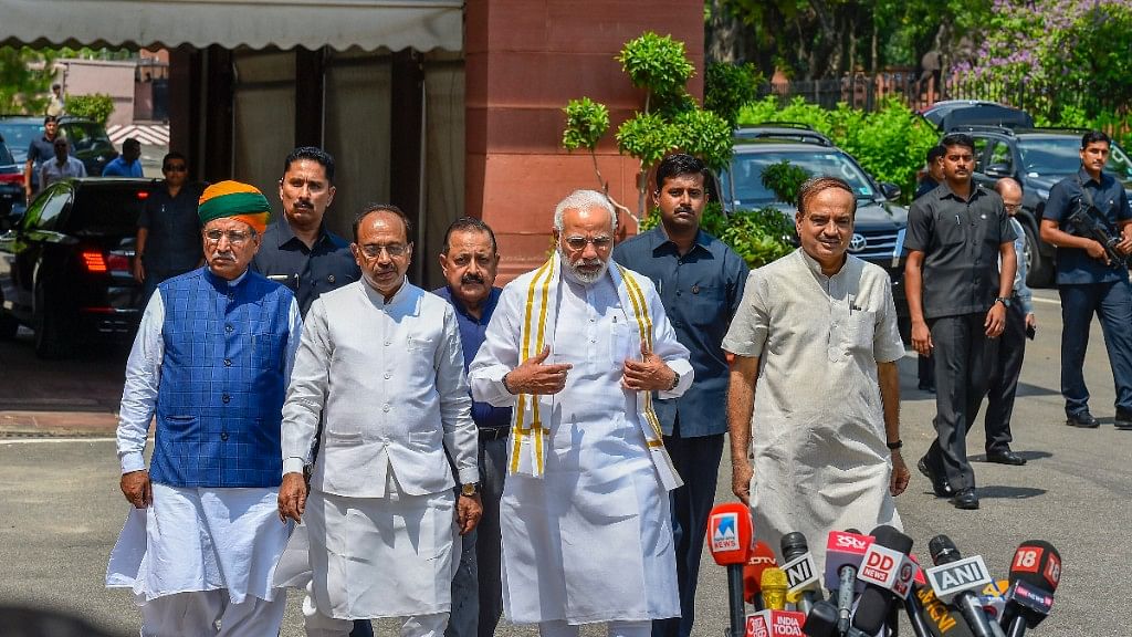 Prime Minister Narendra Modi arrives to address the media ahead of the Monsoon Session of Parliament in New Delhi.