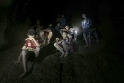 CHIANG RAI (THAILAND), July 3, 2018 (Xinhua) -- Photo provided by Thai Navy Seal shows trapped teenagers in a cave in Mae Sai, Chiang Rai province, northern Thailand, on July 2, 2018. Twelve teenagers and their football coach, trapped in a cave in northern Thailand for nine days, have been found alive on Monday night, Narongsak Osottanakorn, governor of Chiang Rai province said. (Xinhua/IANS)