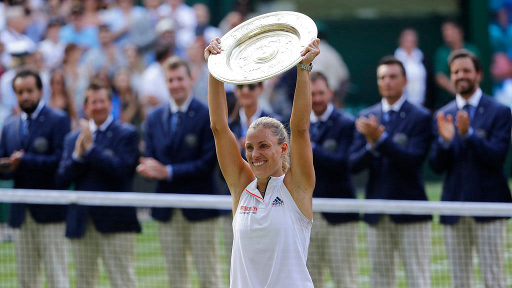 Angelique Kerber celebrates with the Venus Rosewater Dish after defeating Serena Williams in the Wimbledon final.