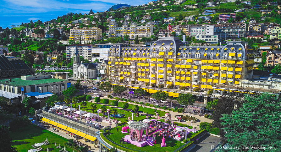 The outdoor space at the Fairmont Le Montreux Palace was decorated in shades of pink and white.