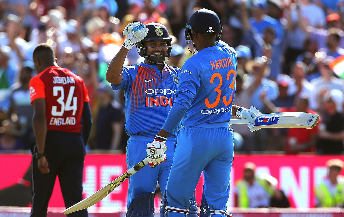 Rohit Sharma scored an unbeaten 100 as India beat England by 7 wickets in the third T20 and sealed the series 2-1.