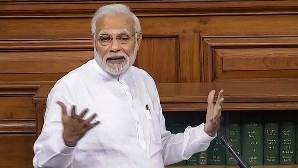 Prime Minister Narendra Modi speaks in the Lok Sabha on no-confidence motion during the Monsoon Session of Parliament, in New Delhi on Friday, 20 July.