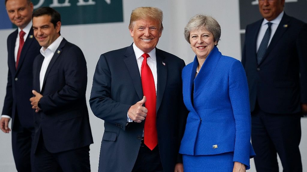 US President Donald Trump (L) and Britain PM Theresa May.