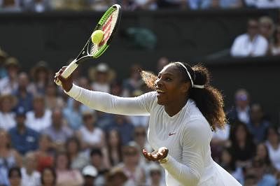LONDON, July 15, 2018 (XINHUA) -- Serena Williams of the United States hits a return during the final of the Ladies