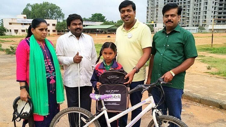 Eight-year-old Manjushree with parents Nagesh and Sudha.