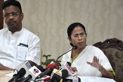 Howrah: West Bengal Chief Minister Mamata Banerjee addresses a press conference at Nabanna in Howrah, West Bengal on July 30, 2018. The first complete draft of the National Register of Citizens (NRC) comprising the names of 2,89,83,677 people of Assam was published online by the Registrar General of India today. Around 40 lakh people have been left out of the list. (Photo: IANS)