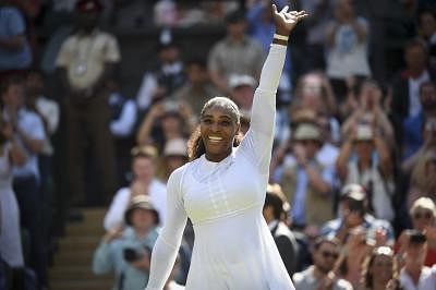 LONDON, July 11, 2018 (Xinhua) -- Serena Williams of the United States greets the audiences after the women