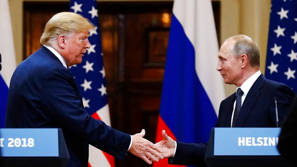 US President Donald trump with Russian President Vladimir Putin.&nbsp;