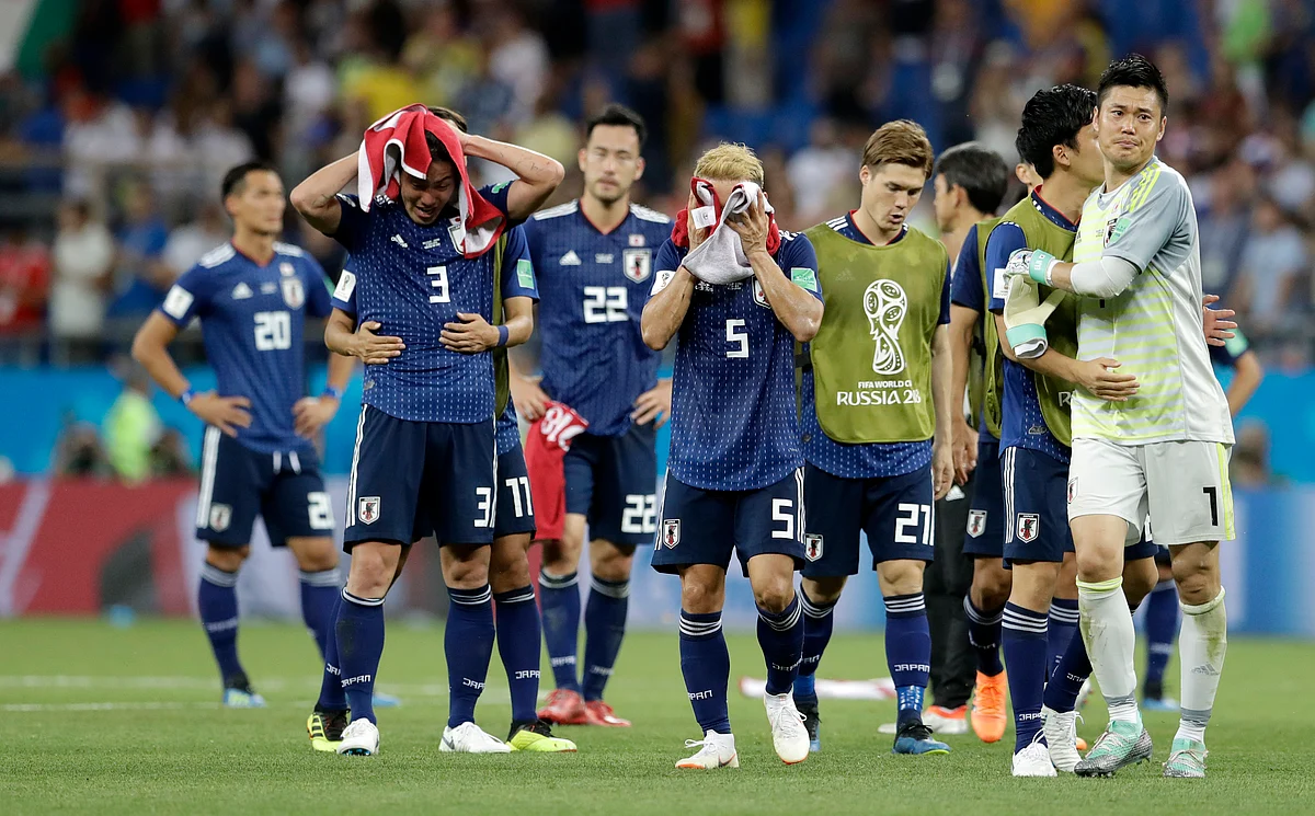 Japan’s players walk off the pitch after losing their Round of 16 match against Belgium at Rostov Arena on Monday.