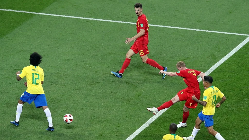 Belgium’s Kevin De Bruyne (second right) scores his side’s second goal during their quarter final match against Brazil at the Kazan Arena on 6 July.