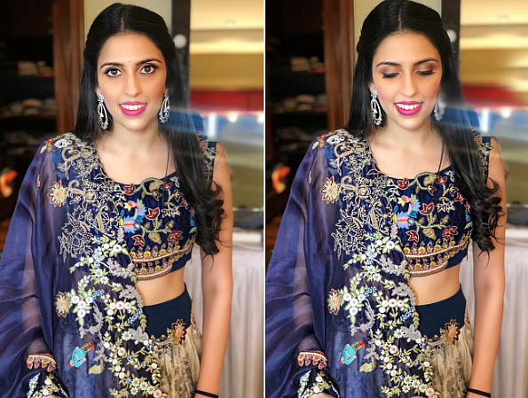 For the pre pre-engagemet bash, the bride-to-be opted for an Anamika Khanna navy blue and cream lehenga laced with heavy embroidery. She rounded off her look with diamond earrings, centre-parted hair and pink lips.