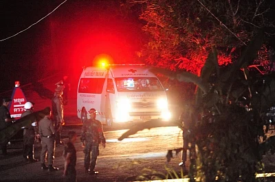 CHIANG RAI, July 9, 2018 (Xinhua) -- An ambulance taking the eighth rescued boy moves to a local hospital in Chiang Rai, Thailand, July 9, 2018. Eight boys have been saved and emerged by Monday evening from a flooded cave where 12 boys and their soccer coach were trapped for more than two weeks. (Xinhua/Rachen Sageamsak/IANS)