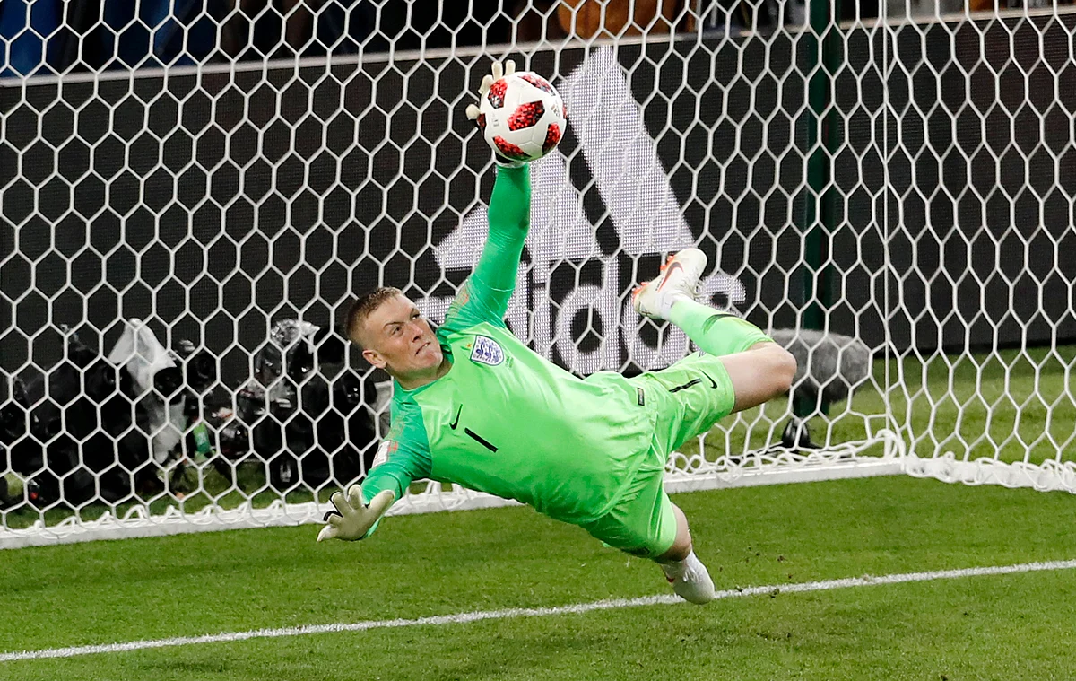 England goalkeeper Jordan Pickford stops a penalty shot from Colombia’s Carlos Bacca during their Round of 16 match at the Spartak Stadium on Tuesday.