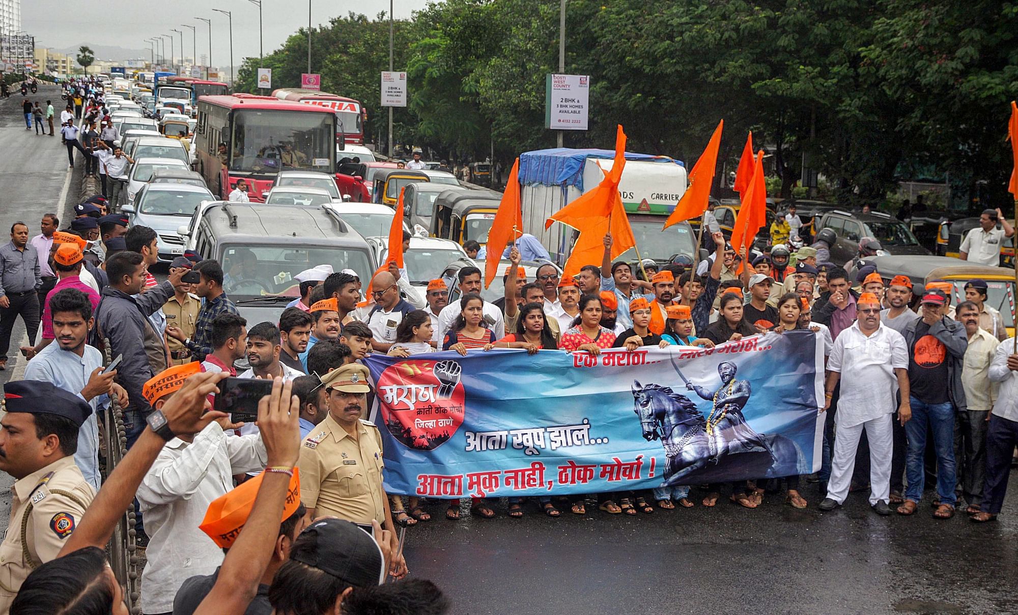 Maratha community protesters stop the traffic during their ‘Maratha Kranti Morcha Rasta Roko’ protest demanding reservation, in Thane, Mumbai on 25 July.