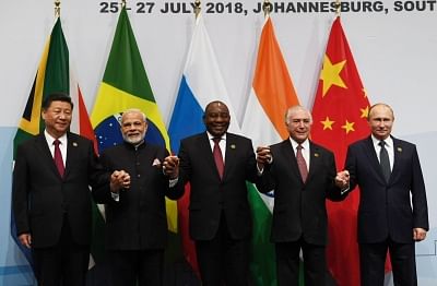 Johannesburg: Chinese President Xi Jinping, Prime Minister Narendra Modi, South African President Cyril Ramaphosa, Brazilian President Michel Temer and Russian President Vladimir Putin during the 10th BRICS Summit at Sandton International Convention Centre in Johannesburg, South Africa on July 26, 2018. (Photo: IANS/PIB)