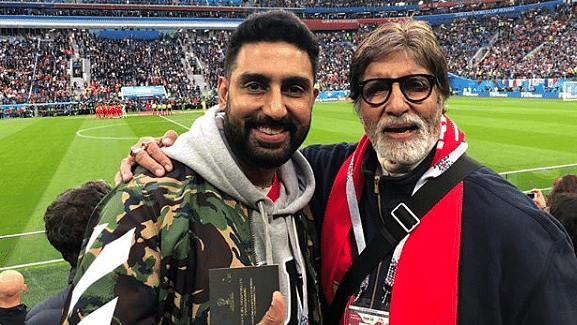 Abhishek and Amitabh Bachchan at the France-Belgium World Cup semi-final match.