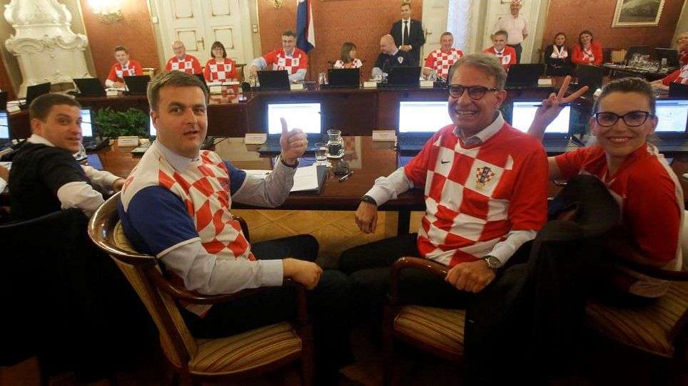 Members of the Croatian cabinet in the national football team’s jerseys.