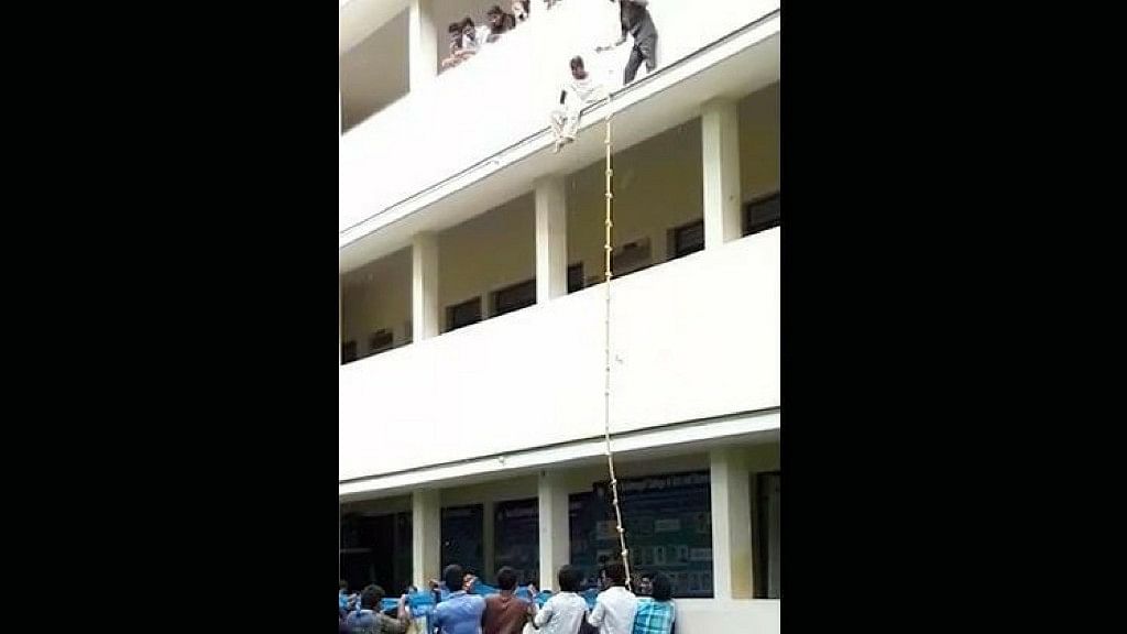 Logeswari was made to sit on the ledge of the second floor, while other students from the college waited below with a safety net.