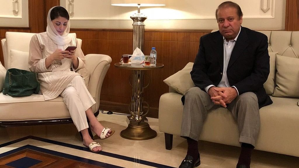 Nawaz Sharif (R) and his daughter Maryam Nawaz Sharif were arrested shortly after they landed in Lahore on 13 July.