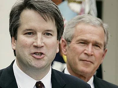 Kavanaugh with former US President George W Bush.