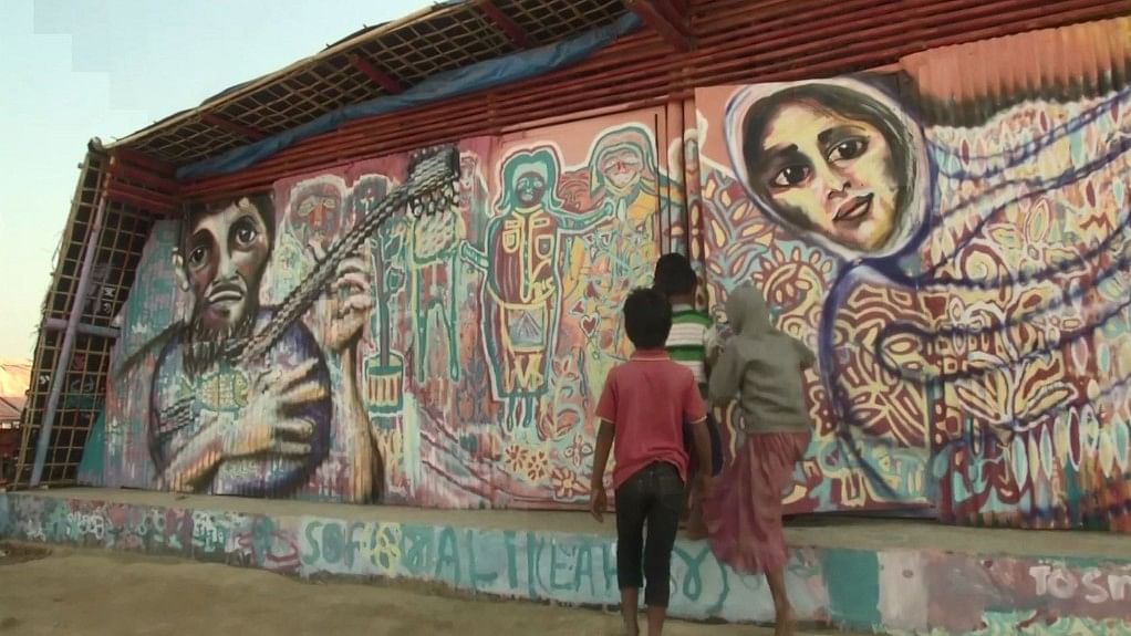 Two artists from New York are bringing colour to the Rohingya refugee camps in Bangladesh.