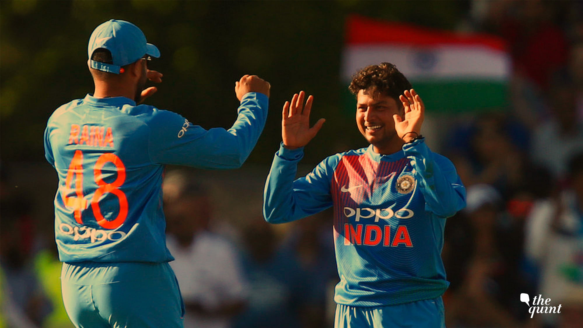 Kuldeep Yadav celebrates a wicket with Suresh Raina during the first T20I against England in Manchester on Tuesday.