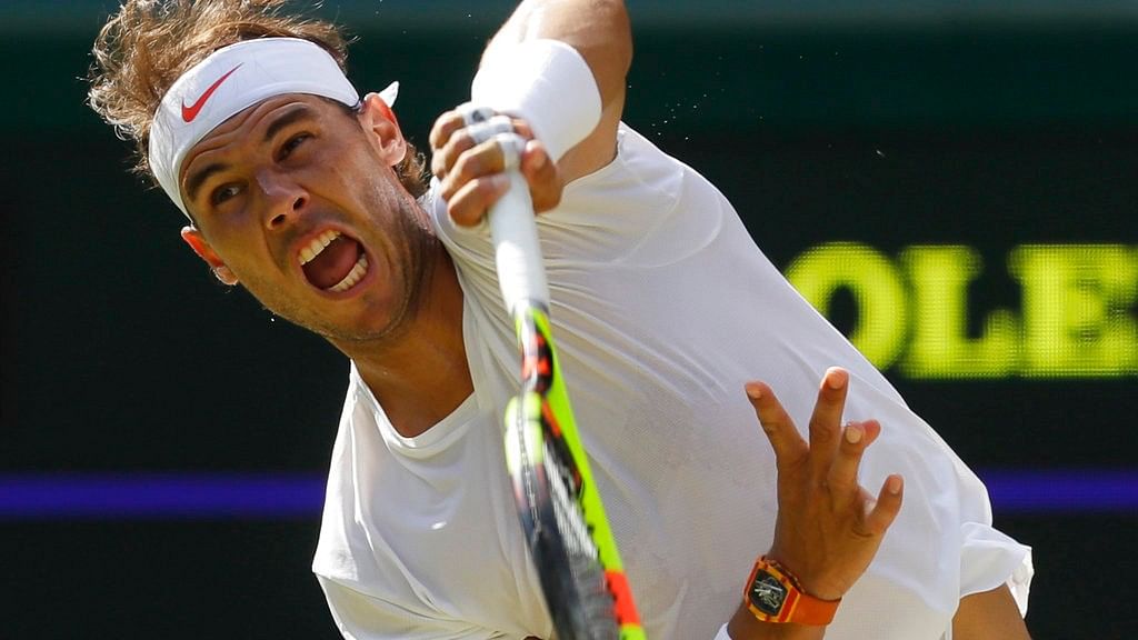Nadal won 7-5 6-7(7) 4-6 6-4 6-4 in a five-hour contest to reach his first Wimbledon semi-final since 2011. 