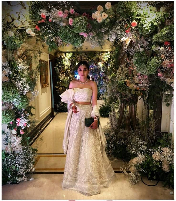Dia Mehta Bhupal photographed against a beautiful floral backdrop.&nbsp;
