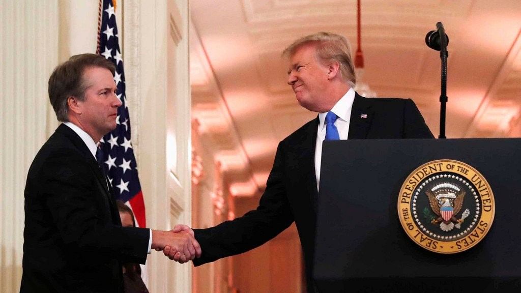 US President Donald Trump introduces his Supreme Court nominee judge Brett Kavanaugh in the East Room of the White House in Washington on 9 July.