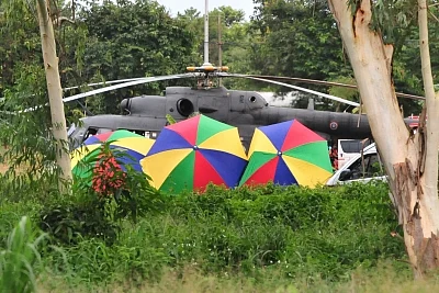 CHIANG RAI, July 10, 2018 (Xinhua) -- An evacuation helicopter is seen in Mae Sai district of Chiang Rai province, Thailand, July 10, 2018. All 12 boys and their football coach have been rescued from a flooded cave in northern Thailand after being trapped for 18 days, Thai navy SEALs confirmed on Tuesday.(Xinhua/Rachen Sageamsak/IANS)