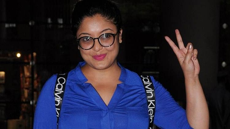 The former Miss India Universe, Tanushree Dutta smiled for the shutterbugs at the airport.