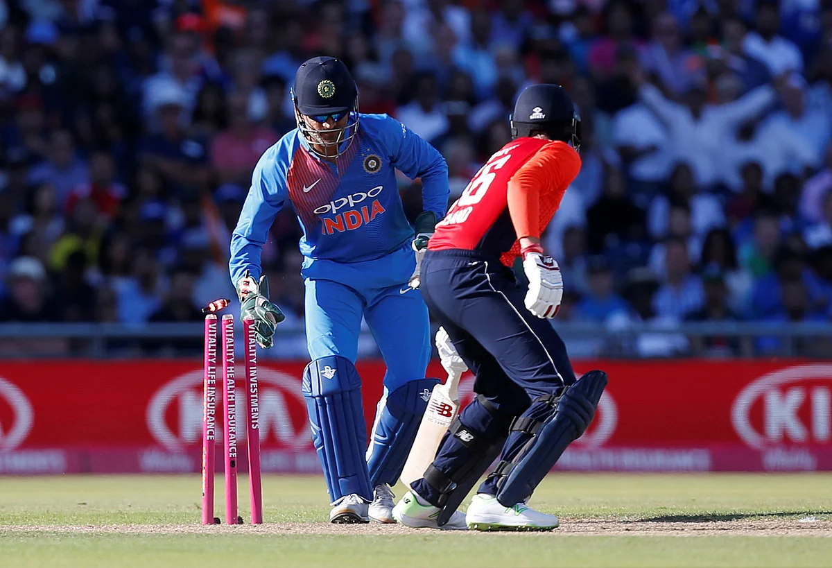 MS Dhoni picks off Joe Root’s bails to send him back to the pavilion.