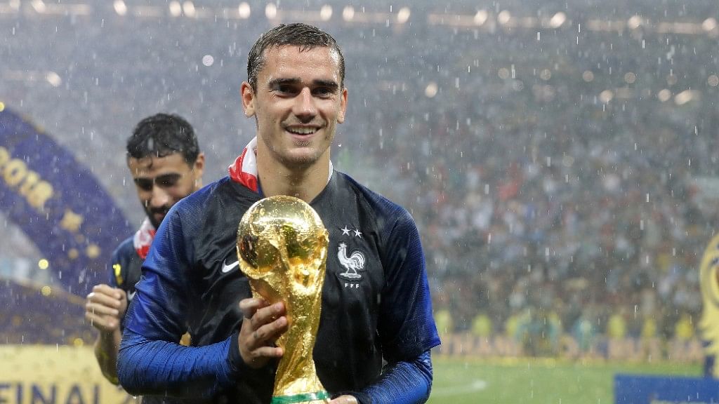France’s Antoine Griezmann celebrates with the trophy after the final match between France and Croatia in the 2018 FIFA World Cup.