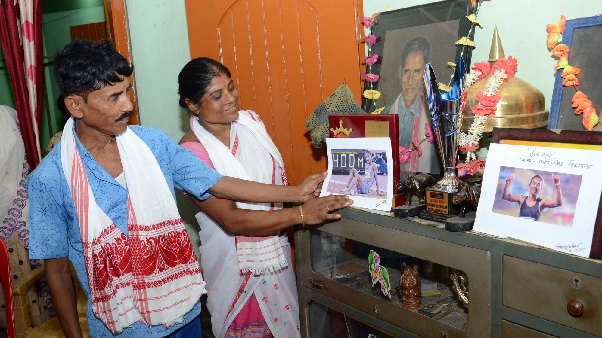 Nagaon: Parents of Hima Das who created history by becoming the first Indian athlete to win a gold at an IAAF event, at their home in Kandhulimari village near Dhing in Assam’s Nagaon district.