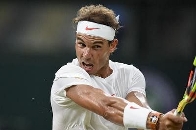Wimbledon curfew forces suspension of Djokovic-Nadal semi