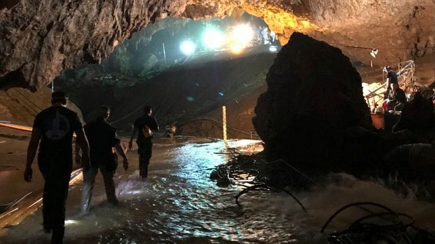 This photo tweeted by Elon Musk shows efforts to rescue trapped members of a youth soccer team from a flooded cave in northern Thailand.