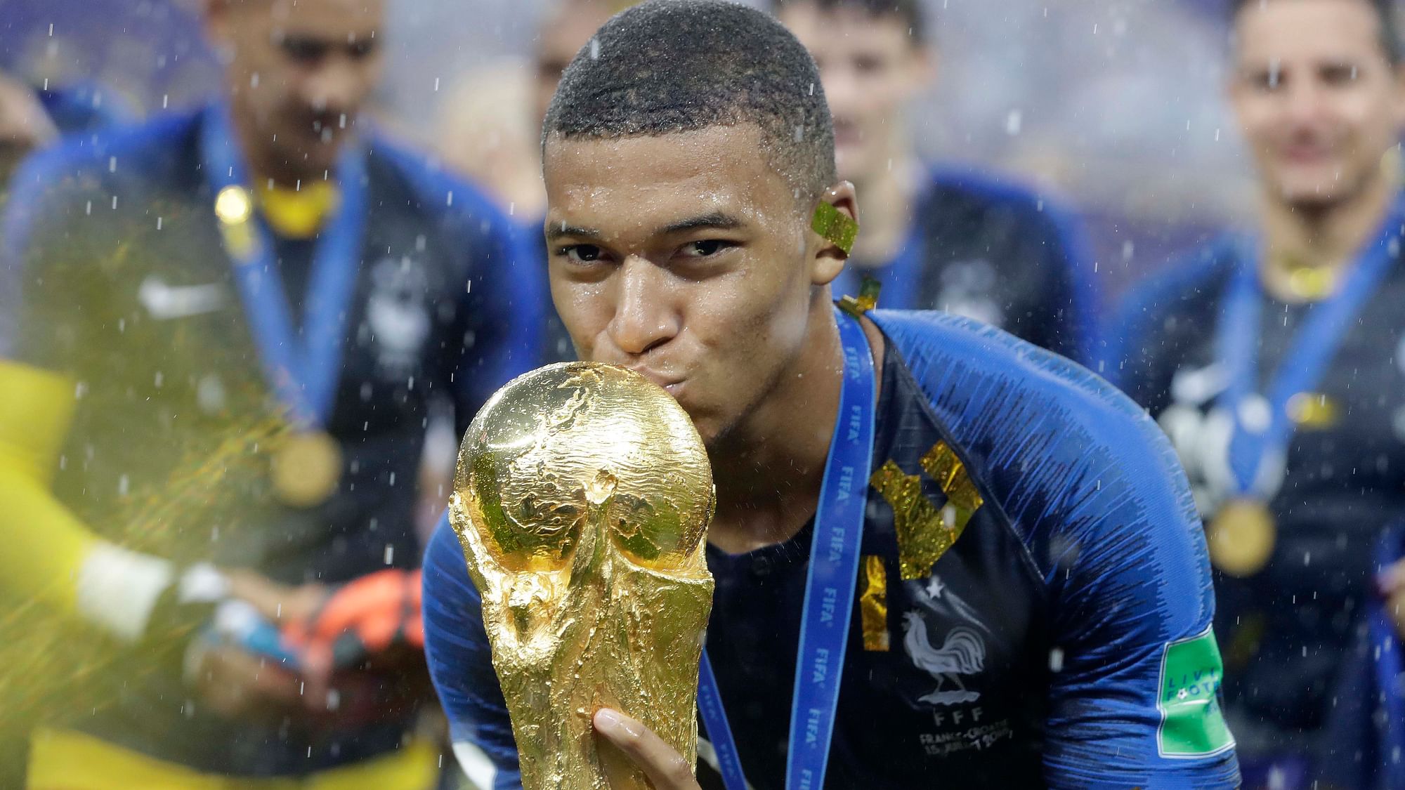 France’s Kylian Mbappe kisses the trophy after the final match between France and Croatia at the 2018 FIFA World Cup in the Luzhniki Stadium in Moscow, Russia, Sunday, July 15, 2018. France won the final 4-2.