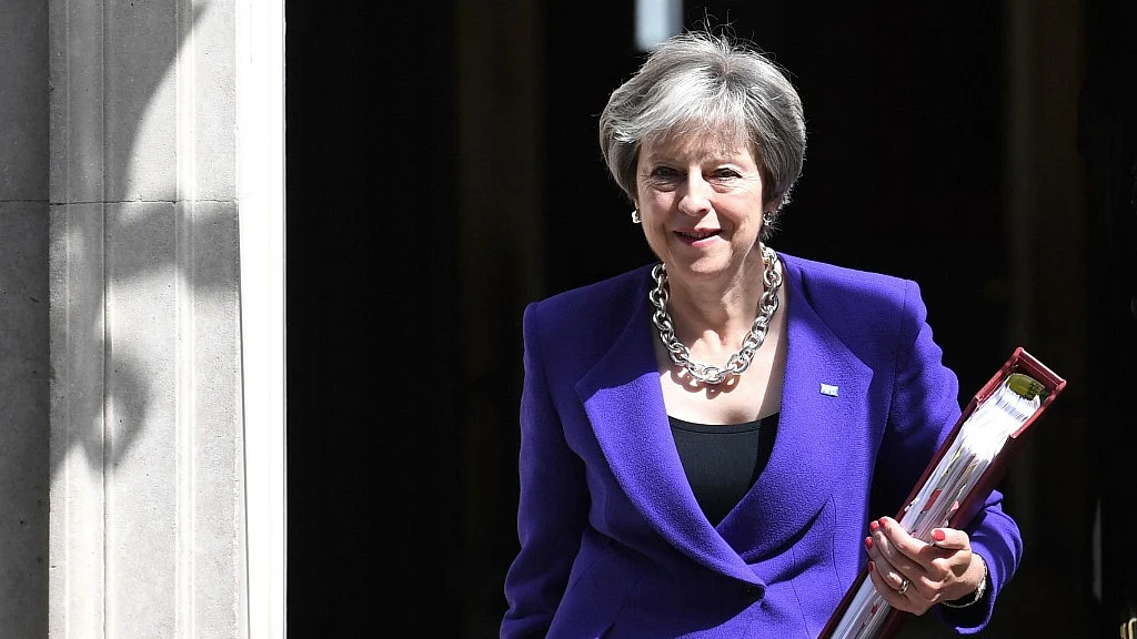 Britain’s Prime Minister Theresa May leaves 10 Downing Street in London. 