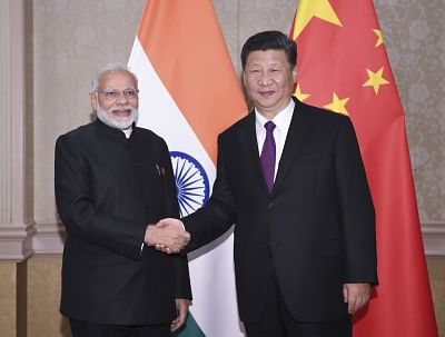 JOHANNESBURG, July 26, 2018 (Xinhua) -- Chinese President Xi Jinping (R) meets with Indian Prime Minister Narendra Modi&nbsp;