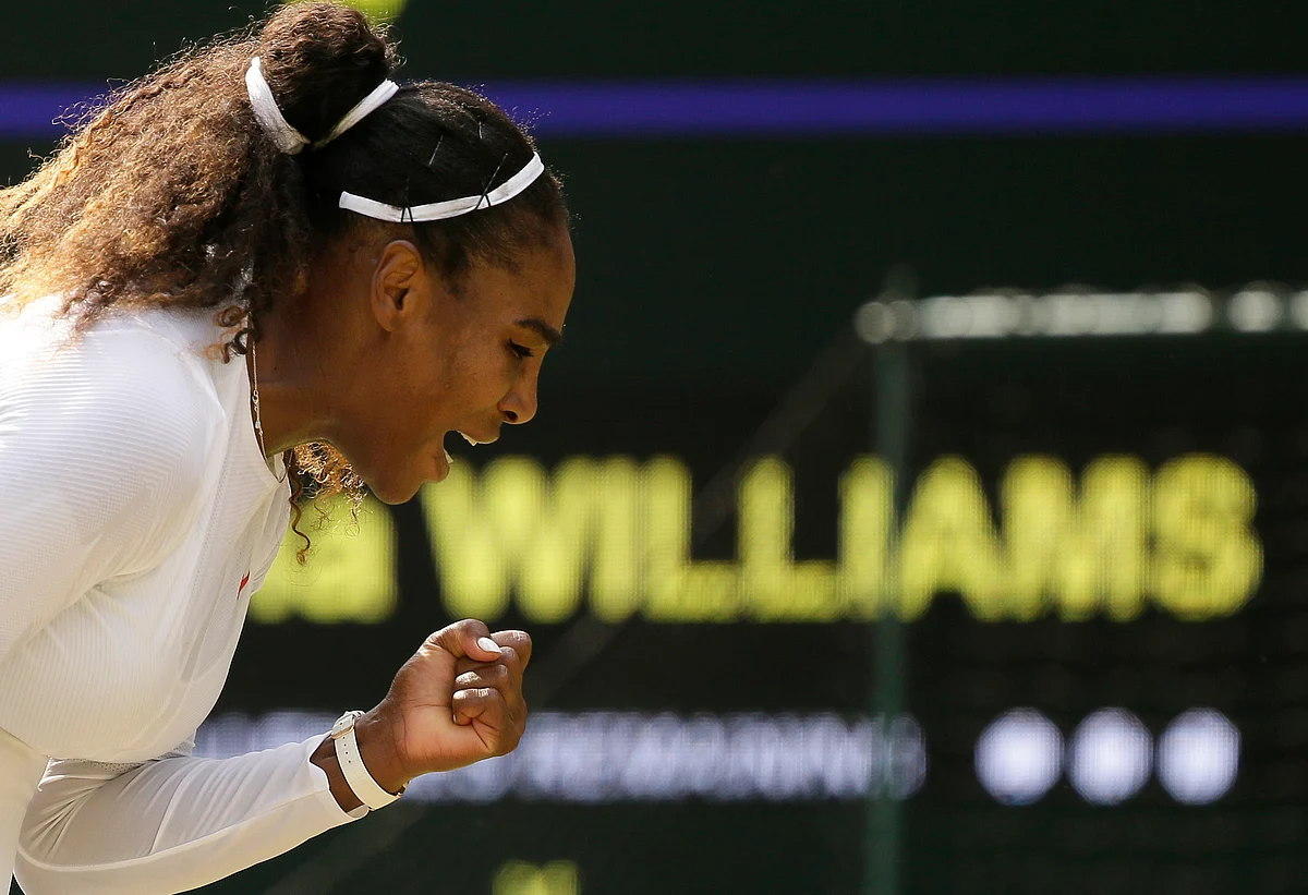 Serena Williams of the United States celebrates winning a point during her women’s singles match against Russia’s Evgeniya Rodina, on day seven of the Wimbledon Tennis Championships, in London, Monday July 9, 2018.