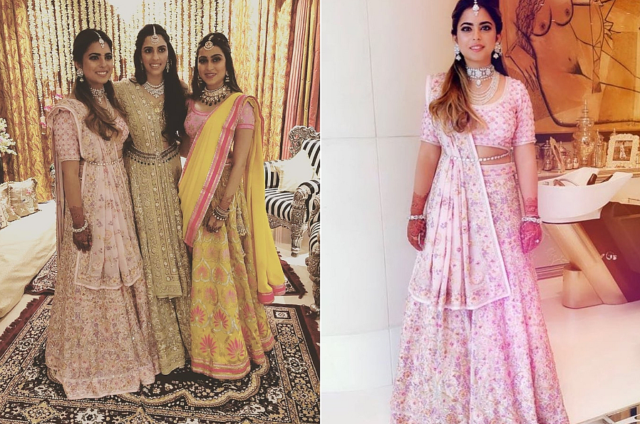 Shloka Mehta was spotted in a decadent gold lehenga, with her soon-to-be sister-in-law Isha Ambani and sister Diya Mehta Jatia for her pre-engagement <i>sangeet</i>. Isha and Diya also wore beautiful Abu Jani Sandeep Khosla ensembles.&nbsp;