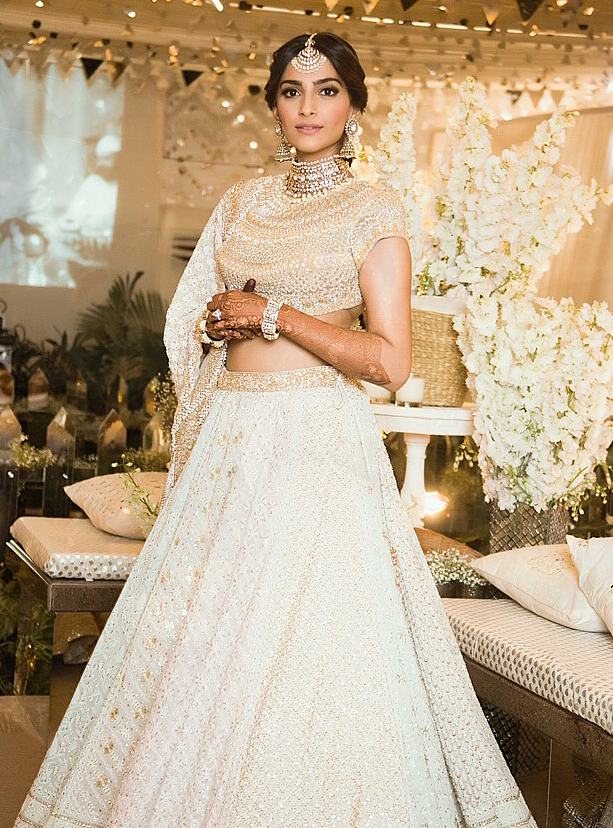 The bride wore a multi-panelled <i>lehenga</i> to her <i>Mehendi-Sangeet</i> that took Abu Jani &amp; Sandeep Khosla’s team 18 months to create!